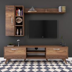 an entertainment center with two shelves and a flat screen tv mounted on it's wall