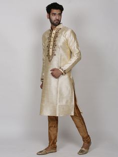 Silk Kurta pyjama With Hand Work & zari work to enrich its style with a beige/Golden colour lower to embellish your occasion This is Beautiful dress can be worn on any occassions like wedding,sangeet,reception or any religious festival Traditional Long Sleeve Sherwani For Puja, Diwali Naqshi Bandhgala Straight Kurta, Long-sleeve Sherwani With Dabka Work For Navratri, Long Sleeve Sherwani With Dabka Work For Navratri, Navratri Long Sleeve Dabka Work Sherwani, Navratri Kurta With Naqshi In Traditional Drape, Bollywood Style Dabka Kurta For Transitional Season, Bollywood Style Dabka Kurta, Festive Traditional Kurta With Naqshi Detail