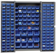 two storage racks with blue bins on them