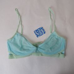 Please Make Sure You Choose The Correct Size! New With Tags Cup Is Not Shaped But Does Have Underwire. Fabric Is See Thru Color Is Blue And Band Is A Blue/Green Color Intimately Free People Blue Padded Bra For Spring, Spring Light Blue Bra With Padded Cups, Light Blue Underwire Bra For Spring, Spring Light Blue Padded Bra, Spring Light Blue Underwire Bra, Blue Summer Bra With Built-in Support, Green Underwire Bra For Summer, Light Blue Underwire Bra With Padded Cups, Stretch Underwire Bra In Light Blue