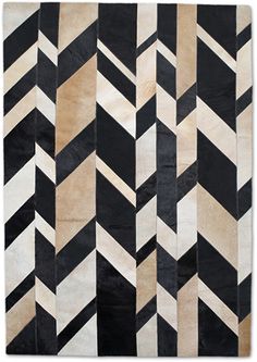 a black and white rug with different patterns on it