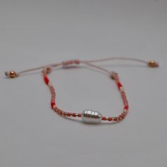 These fun delicate beaded bracelets are fully adjustable making them the perfect gift. Wear with other stacking bracelets or alone.   The colors are gorgeous. red, orange, salmon, pale peach and gold glass and gold-plated seed beads on durable blush silk cord.  Freshwater pearl adds a little bit more to the sliding bead bracelet. Fully adjustable from 5" - 9" Peach And Gold, Orange Salmon, Stacking Bracelets, Pale Peach, Cord Jewelry, Silk Cord, Fresh Water Pearl, Gold Glass, Bracelet Stack