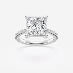 a princess cut diamond engagement ring with pave set shoulders