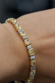 Platinum tennis bracelet with yellow gold radiant cut diamonds 14.9ct and 4.82ct emerald cut diamonds. #tennisbracelet Yellow Diamond Eternity Ring, Yellow Diamond Tennis Bracelet, Tennis Bracelet Designs, Emerald Cut Tennis Bracelet, Yellow Diamond Bracelet, Emerald Tennis Bracelet, Mens Accessories Bracelet, Real Diamond Necklace, Custom Engagement Rings