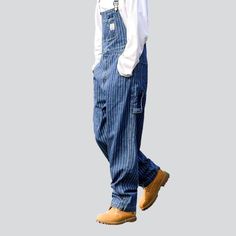 Introducing the 2023 Spring-Summer Collection of our new men's striped free denim dungarees ââ‚?the perfect way to show off your street style!Why You'll Love ThemFashionably rebellious. these dungarees feature vertical stripes and a loose fit for an effortless. laid-back look. With suspenders and a buttons closure. you'll be sure to stand out from the crowd in a stylish and comfortable way. Crafted from high-quality denim. these dungarees promise to be as durable as they are fashionable.Key High Trendy Cotton Jeans With Vertical Stripes, Casual Vertical Striped Jeans For Summer, Casual Summer Jeans With Vertical Stripes, Casual Striped Overalls With Pockets, Casual Vertical Stripes Denim Jeans, Striped Denim Jeans With Pockets, Striped Cotton Jeans With Pockets, Striped Cotton Overalls, Casual Striped Denim Pants