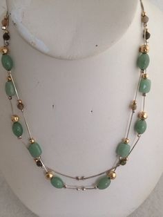 "Genuine Aventurine Sectional Beaded Double Snake Chain Sterling Silver 925 Hammered Accent Gold & Silver Beads stunning Necklace Smokey glass and gold bead accents Marked 925 = Sterling Silver Measures length - each chain measures approx 16\"Free Shipping on orders over $35.00 however if there is a return buyer to refund seller for the free shipping cost to seller." Elegant Aventurine Beaded Necklaces With Polished Beads, Elegant Aventurine Beaded Necklace With Polished Beads, Aventurine Beaded Necklace With Faceted Beads, Silver Aventurine Round Beads Jewelry, Silver Jade Jewelry With Faceted Beads, Stunning Necklace, Snake Chain, Gold Beads, Silver Beads