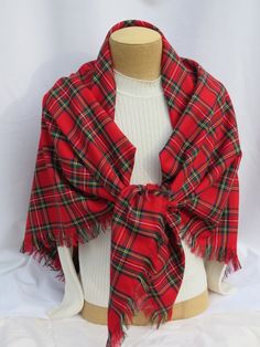 Very popular at Christmas, this blanket scarf in Royal Stewart tartan makes a great accent to your outfit or our Christmas photos. This over size scarf makes an excellent give for the ladies on your list who like to dress in current fashion. You can not go wrong with giving this Royal Stewart plaid over size scarf as a gift to a co worker at the office.Be practical and wear this to keep out the brisk breeze or use it to dress up your outfit. This big 56" x 56" polyviscose tartan scarf has 2" fri Scottish Plaid Winter Scarf, Tartan Blanket Scarf, Air Force Families, Stewart Plaid, Royal Stewart Tartan, Tartan Blanket, Stewart Tartan, Tartan Scarf, Current Fashion