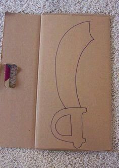 an open book with a drawing of a banana on the cover and a piece of tape next to it