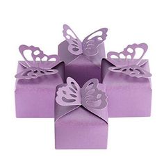 four purple boxes with butterfly cutouts on the top and one has a bow at the bottom