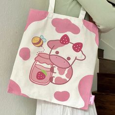 This adorable tote bag has designs on both sides. The front features Bella the strawberry cow and the back has a plain cow pattern. It's perfect for everyday use! Item Details:♡Heavy Duty 12 oz canvas ♡Pocket with zipper for phone and key ♡Zipper on the top of the bag ♡Length 34 x Height 40 cm ♡Handle 3 x 56 cm ♡Digitally printed front and back designs How to care: Gentle wash with water, please avoid using harsh detergents and soaps. Tote Bag Inspo Paint, Painting Tote Bag Ideas, Cat And Cow, Boba Plushie, Plushie Backpack, Paint Tote Bag, Kawaii Tote Bag, Diy Tote Bag Design, Painted Canvas Bags