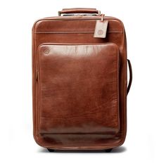 The Piazzale Classic Leather Luggage For Trip, Classic Luggage With Leather Lining For Weekend Trips, Classic Luggage With Sleeve For Travel, Classic Cognac Luggage With Sleeve, Rectangular Cognac Luggage With Sleeve, Classic Luggage With Leather Lining For Business Trips, Classic Luggage For Weekend Trips With Sleeve, Classic Luggage For Weekend Trips With Luggage Sleeve, Elegant Brown Luggage For Overnight Trips