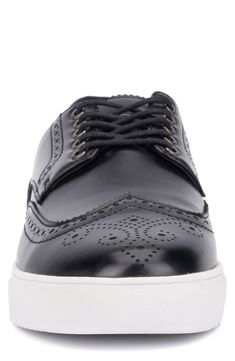 This shoe boasts a timeless faux leather brogue design paired with a comfy, sturdy rubber sole, perfect for elevating any outfit from casual to evening attire with ease. Lace-up style Comfort cushioned footbed Synthetic upper and lining/rubber sole Imported Leather Brogues, Tom Ford Sunglasses, Sneaker Men, Flip Flop Slippers, Baby Boy Shoes, Sweaters And Leggings, Comfortable Sandals, Evening Attire