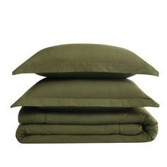 three pillows stacked on top of each other in front of a white background and one is green