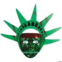 The officially licensed The Purge: Election Year Lady Liberty Light Up Mask! This mask features stitched Green LED Lights, a sturdy foam crown and AA battery pack with three flashing modes that can easily clip on to your pants or pocket. Batteries not Included. One size fits most adults. The Purge Anarchy and all related marks and characters are trademarks and copyrights of Universal Studios. Licensed by Universal Studios. All rights reserved. Foam Crown, Creepy Masks, Green Face Mask, Mascaras Halloween, Mask Aesthetic, Green Led Lights, Plastic Mask, Trick Or Treat Studios, Party Expert