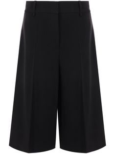 black virgin wool cut-out detailing concealed front fastening belt loops tailored design rear welt pocket Wool Cut, Tailored Shorts, Yoko London, Tailored Design, Exclusive Fashion, Shorts Black, Lady Dior, Welt Pocket, Jacket Tops