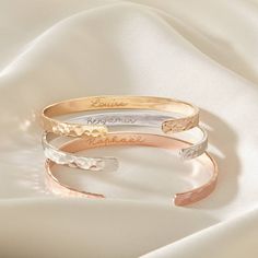 These elegant, high-quality bangles are the ultimate gift for any jewellery lover. Make your gift extra special with a personalised engraving of your choice. All our hand engraving is done by our skilled London-based team just for you. DIMENSIONS * 925 sterling silver, 18k gold plated or 18k rose gold plated * Measurements approx. 6cm x 5cm, opening of 2.5cm * Width of bangle: 5mm * Hand-engraved in our stylish cursive script (on the inside only) 60 characters max * Complimentary gift box DELIVE Bangle Stacking, Classic Bangles, Engraved Bangle, Sapphire Birthstone, Cursive Script, The Bangles, Open Bangle, Stacked Bangles, Bridesmaids Personalized