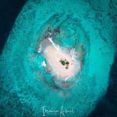 an island in the middle of some water