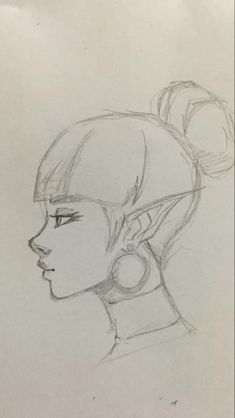 a drawing of a woman's head with ear rings