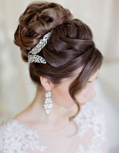 a woman wearing a wedding hair comb