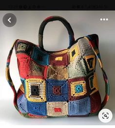 a multicolored purse is displayed on a white background with an instagram button