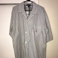 This Is A "Polo Ralph Lauren" Short Sleeve Shirt, New Without Tags. It Is Gray And White Pinstripe, With A Red Polo Pony On The Front Pocket. 100% Cotton, Made In El Salvador. Size Large Men's. Casual Striped Shirt For Loungewear, Striped Cotton Shirt For Loungewear, Striped Relaxed Fit Shirt For Loungewear, White Camp Collar Shirt For Loungewear, Casual White Shirt For Daywear, White Relaxed Fit Shirt For Loungewear, Casual White Daywear Shirt, White Cotton Shirt For Loungewear, White Collared Shirt For Loungewear