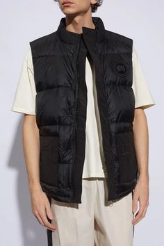 Black ‘Paradigm’ down vest from Canada Goose. Emblazoned with a logo patch on the front, this style fastens with a two-way zip and snaps and features a standing collar and four slip pockets. Temperature range: 5°C/-5°C. Model's Measurements Height: 193cm Chest: 95cm Waist: 82cm Hips: 93cm Model is wearing size: L Men Outerwear, Canada Goose Mens, Heeled Rain Boots, High Heel Rain Boots, Standing Collar, Shoe Boot Sandals, Down Vest, Mens Outerwear, A Logo