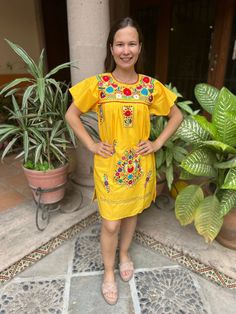 This beautiful typical Mexican dress is characterized by its freshness to be worn at all times, made of cotton fabric embroidered by hand by artisans from the state of Oaxaca. The embroidery of each dress is unique so it may vary. Mexican textile art has centuries of history and creativity throughout the country. Mexico is recognized as one of the leading countries with a beautiful aristic production in the textile world, miraculous hands of talented artisans from different states of the country create stunning embroidery clothing, and various items. #Oaxaca #Chiapas We ship anywhere in the word, from Tepic, Nayarit,  mx. Made by artisans from Oaxaca, Mx We recommend washing by hand with cold water, tender in the shade, to better preserve the original color Traditional Dress For Fiesta And Cinco De Mayo, Cotton Dress With Embroidered Border For Traditional Ceremonies, Traditional Embroidered Dress For Cinco De Mayo Beach Event, Folk Style Cotton Dress For Fiesta, Summer Dresses With Floral Embroidery For Traditional Ceremonies, Summer Floral Embroidery Dress For Traditional Ceremonies, Traditional Cotton Dress For Fiesta, Cotton Dresses With Embroidered Border And Short Sleeves, Summer Folk Dress For Traditional Ceremonies