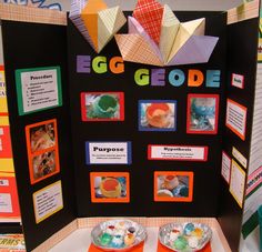 an egggeode display with two plates on the table