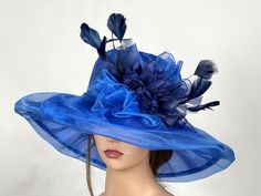 "Vogue hats are perfect for horse racing events, church, the Kentucky derby, weddings, garden tea parties and charity events. There is a tie on the inside of the hat that helps adjust the size from large to small. 100% Brand new, hand made and high quality. One size hat (20\"-22\") Thank you very much for shopping at my shop. Have a great day." Brimmed Blue Top Hat For Royal Ascot, Blue Brimmed Top Hat For Royal Ascot, Blue Mini Hats For Royal Ascot Garden Party, Blue Top Hat For Summer Wedding, Blue Top Hat For Spring Church Events, Blue Mini Hat For Formal Spring Events, Blue Top Hat For Church In Spring, Blue Top Hat For Spring Party, Blue Mini Hats For Spring Formal Occasions