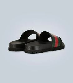 Accented with the label’s signature green and red stripes, these Gucci Web slider sandals are crafted entirely from rubber and feature a molded footbed, and track sole..Made in Italy.Designer color name: Black.Fits small to size - we recommend trying one size larger.UK sizes Green Slides With Textured Footbed, Rubber Sole Slide Sport Sandals, Green Flat Slides With Removable Insole, Green Cushioned Slip-on Slides, Green Round Toe Slides With Rubber Sole, Gucci Open Toe Leather Slides, Flat Slides With Rubber Sole, Gucci Leather Open Toe Slides, Gucci Cushioned Slide Sandals