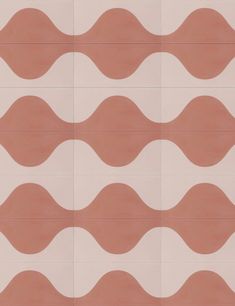 a white and brown wall with wavy lines on it