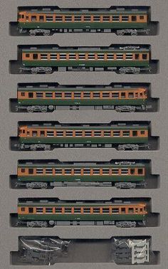 six train cars are lined up in a row