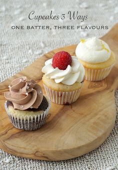 three cupcakes are sitting on a wooden board with the words cupcakes's ways one batter, three flavors