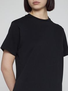 Toteme s black cotton regular-fit t-shirt with a crew neck. Composition: 100% orgainic cotton Alessandra Rich, Rene Caovilla, Pleats Please Issey Miyake, Marine Serre, Gorgeous Bags, Sneaker Wedge, Yoga Wear, Cotton T Shirt, Black Cotton