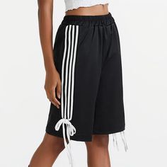 These black side-stripe shorts with charming bow accents. The relaxed fit and elastic waistband offer all-day comfort. Ideal for adding a cute yet sporty vibe to your everyday look Size:• S: Waist: 66cm/ 26.0 in, Length: 56cm/ 22.0 in, Hips: 108cm/ 42.5 in• M: Waist: 70cm/ 27.6 in, Length: 57cm/ 22.4 in, Hips: 112cm/ 44.1 in• L: Waist: 74cm/ 29.1 in, Length: 58cm/ 22.8 in, Hips: 116cm/ 45.7 inMaterial: Polyester E Girl Clothes, Stripe Shorts, Wide Leg Sweatpants, Striped Ribbon, Knee Length Shorts, Aesthetic Women, Black Side, Summer Fabrics, Side Stripe