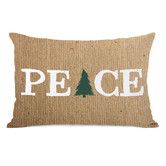 a pillow with the word peace on it and a christmas tree in white letters that says peace