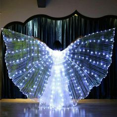 PRICES MAY VARY. Lace Performance Props: Cloak shaped wing make you like a butterfly, let you be a most eye-catching star on the stage. LED Glowing: With many LED lamp beads which has high brightness and can illuminate the entire performance area. Steps For Usage: 1. Add AA ba-tteries; 2. Set telescopic baton to desired length; 3.Place baton inside slot on both sides or veil; 4. Put neck loop around neck; 5. Press button to turn on. With Stick: The wing comes with a pair of portable telescopic s Led Wings, Lead Belly, Belly Dancer Outfits, Belly Dance Accessories, Belly Dancer Costumes, Women Dance, Dancer Costume, Led Dance, Dance Accessories