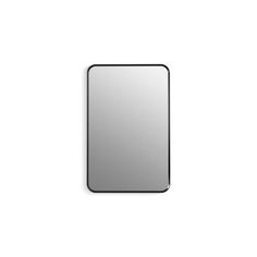 a square mirror on a white wall with no reflection in the mirror, it is black and silver