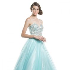 This Exquisite Gown Is Designed To Make You Feel Like A True Princess, Dazzling Everyone In Your Path. The Sweetheart Neckline Is Both Romantic And Flattering, Accentuating Your Dcolletage And Framing Your Face With A Touch Of Grace And Allure. It Creates A Feminine And Whimsical Look That Is Sure To Turn Heads. Length: Long Color: Aqua-Silver Neckline: Sweetheart Silhouette: A-Line Sleeve: Sleeveless, Strapless Back: Lace Up Embellishments: Sequins, Rhinestones Occasion: Romantic Date/Evening/D Blue Ball Gown With Sweetheart Neckline For Homecoming, Blue Sweetheart Neckline Ball Gown For Homecoming, Light Blue Strapless Dress For Gala, Light Blue Prom Gown With Sweetheart Neckline, Light Blue Sweetheart Neckline Gown For Prom, Light Blue Sweetheart Neckline Prom Gown, Light Blue Evening Dress With Sweetheart Neckline For Gala, Blue Strapless Ball Gown With Fitted Bodice, Light Blue Evening Dress With Sweetheart Neckline