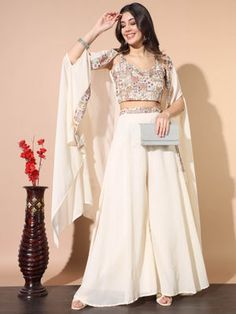 Buy Chhabra 555 Cream Embroidered Flared Crop Top and Palazzo with Shrug (Set of 3) (XXS) Online Palazzo With Shrug, Palazzo With Crop Top, Crop Top With Shrug, Crop Top With Palazzo, Shrug Crop Top, Nykaa Fashion, Flared Palazzo, Trendy Outfits Indian, Wedding Lehenga Designs