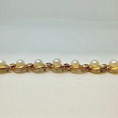 14K Gold Vintage 7.25" Bracelet with Pearls (includes appraisal, Value: $6,000) Designer = Jewelry Material = 14K Gold Gemstone = Pearl Condition = Good Location: Glencoe Item Number: 20229-16 Item ID: 281648 Category: Bracelet Luxury Pearl Bracelet For Evening, Classic White Evening Bracelets, Flexible 14k Gold Bracelet For Formal Occasions, Formal Rose Gold Bracelet With Oyster Clasp, Formal Rose Gold Bracelet With Oyster Design, Luxury Pearl Jubilee Bracelet For Formal Occasions, Formal White Gold Jubilee Pearl Bracelet, Formal Rose Gold Oyster Bracelet, Formal Jubilee Chain Bracelet