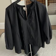 Womans Black Linen Swing Blouse. By A New Day. New With Out Tags. Never Worn. Light And Flowy High/Low Design Size Medium Black Shirt For Layering In Spring, Black Long Sleeve Tops For Daywear, Long Sleeve Black Tops For Daywear, Casual Black Blouse For Layering, Black Long Sleeve Blouse For Daywear, Chic Black Top For Daywear, Black Cotton Blouse For Fall, Spring Daywear Black Shirt, Black Spring Shirt For Daywear