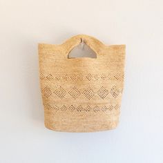 IN STOCK NOW SHIPPING FROM LOS ANGELES Embrace summer vibes with the Elena Handbags Hand Woven Fashion Raffia Beach Bag. This trendy handbag is made from raffia and features a hand woven design, perfect for a day at the beach. Stand out with this unique and stylish fashion accessory. Natural Soft Raffia Straw Handmade Bohemian Rectangular Bucket Bag For Beach Season, Bohemian Bucket Bag For Beach Season, Bohemian Natural Bucket Bag For Summer, Bohemian Rectangular Bags For Vacation, Bohemian Rectangular Beach Season Bucket Bag, Summer Bohemian Hobo Bag With Double Handle, Bohemian Bucket Bag With Braided Top Handle, Bohemian Hobo Bag With Double Handle For Summer, Handwoven Shoulder Bag For Everyday Use And Vacation