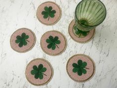 Introducing the Clover Leaf Shamrock Beaded Round Coasters - the perfect blend of elegance and Irish charm! These coasters feature a stunning clover leaf design, intricately woven with shimmering beads to create a captivating centerpiece for any tabletop. Not only do they provide a sturdy surface to rest your drink, but they also add a touch of sophistication to your decor. With their round shape and durable construction, these coasters are sure to become your new favorite way to protect your fu Centre Table, Round Coasters, Living Room And Dining Room, Green Beads, Green Bead, Handmade Products, Clover Leaf, Drink Coasters, Leaf Design