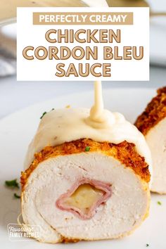 chicken cordon bleu sauce is being drizzled over the meat