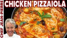 a man standing in front of a pizza with the words chicken pizzeria on it