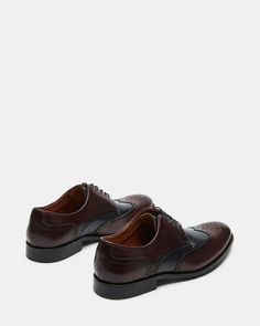 Experience the timeless style and sophistication with our EDREES dress shoes. Made with a genuine leather upper and featuring a classic wingtip design, these lace-up dress shoes blend perfectly with any formal outfit. Elevate your wardrobe with these expertly crafted, stylish, and comfortable dress shoes. 1 inch heel height Leather upper material Textile and synthetic lining Textile and synthetic sock Rubber sole Imported Wingtip Oxford Lace-up Shoes With Textured Sole, Timeless Wingtip Oxfords For Formal Occasions, Textured Sole Wingtip Oxfords, Timeless Formal Wingtip Oxfords, Formal Goodyear Welted Oxford Shoes, Formal Goodyear Welted Oxfords, Goodyear Welted Oxford Leather Shoes For Formal Occasions, Timeless Oxford Lace-up Shoes For Formal Occasions, Classic Semi-formal Oxfords With Perforated Toe Box