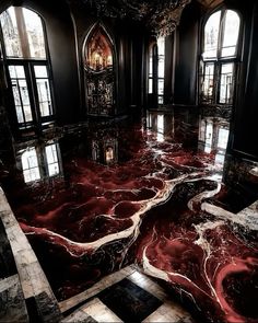 the floor is covered in red marble and has windows to let in light from them