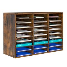 a wooden shelf with many files and folders