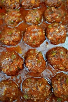 meatballs are cooked in tomato sauce and seasonings